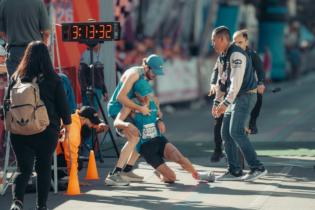 11-year-old Ben Dick breaks half marathon record at 500 Festival Mini-Marathon, beats his dad